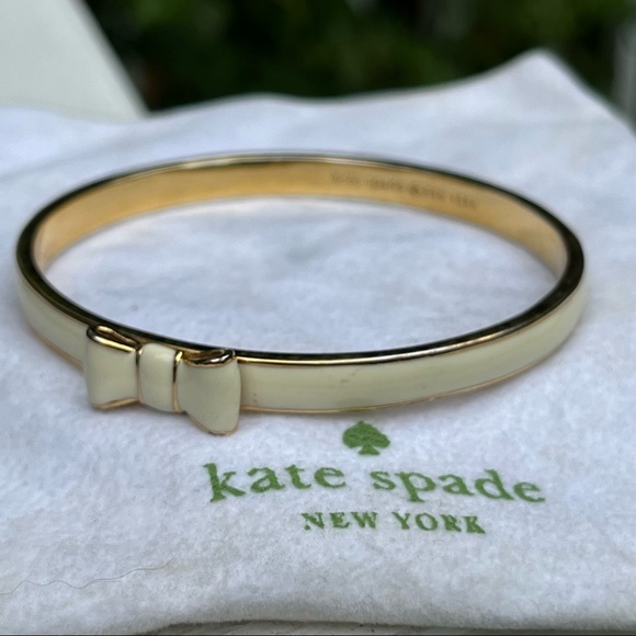 Kate Spade Take a Bow Bangle Bracelet in Cream - Picture 1 of 9